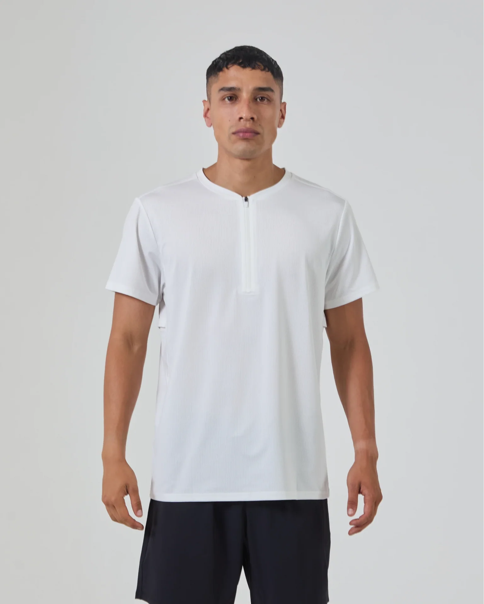 sp24-new-flowstate-zip-tee__white__frontcrop_1x_x1920_e761e99b-aabb-4129-996b-6ae2f9b75c4d.webp
