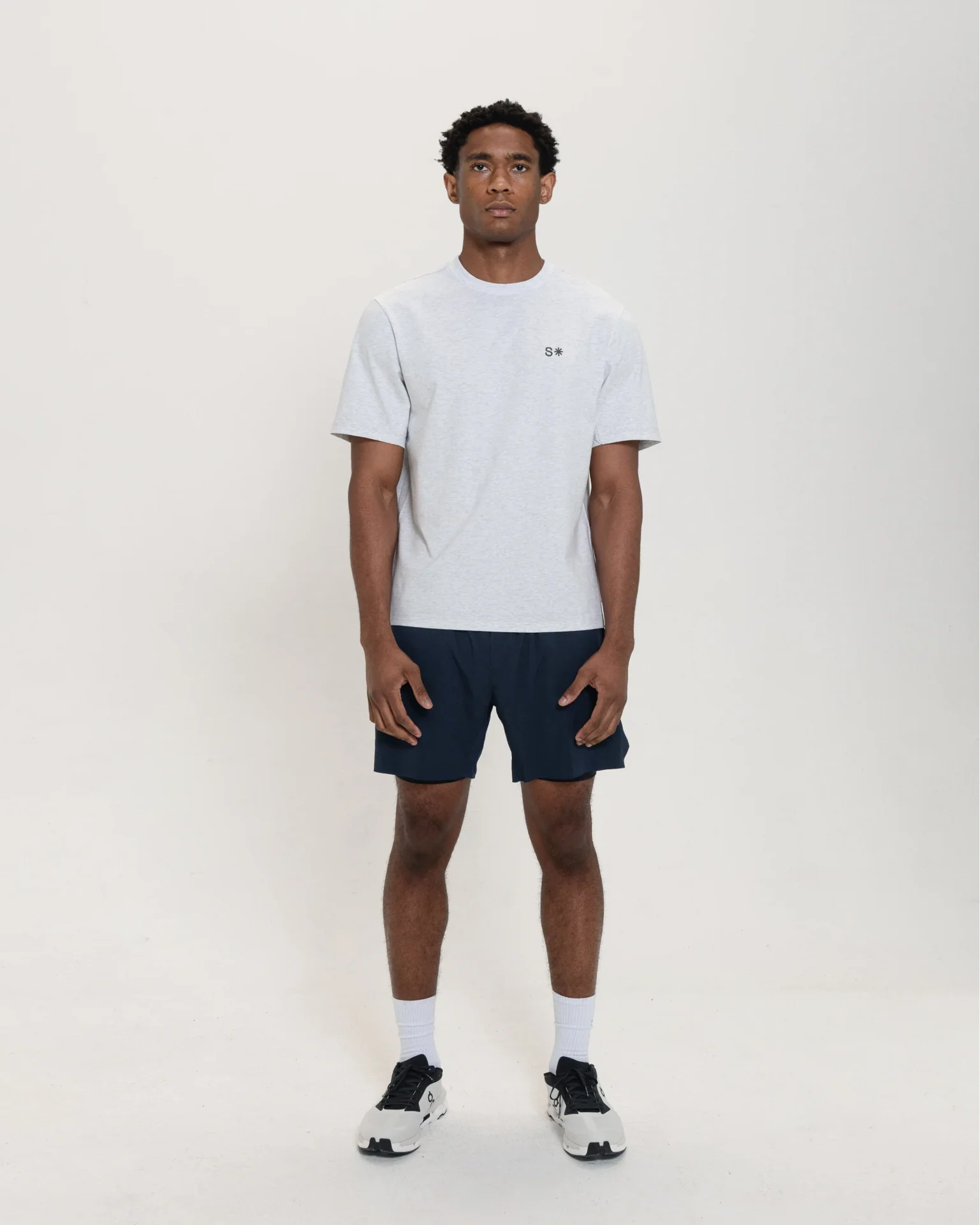 stack_hybridt_tee__white-heather__fullbody_front_1x_x1920_1177a9d3-fbdb-41e0-b505-6e2893e23bd4.webp