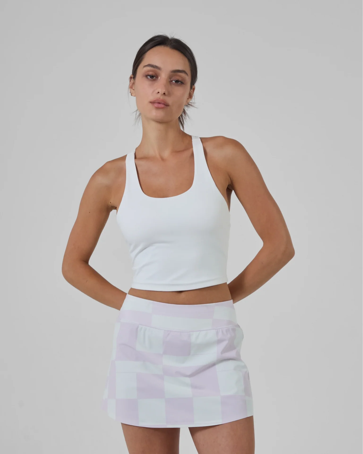 stack_rallycomp_tank__white__front_crop_1x_x1920_ebbdde5d-a597-4196-9a24-d77a318bab30.webp